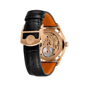 Back shot image of IWC Portugieser Hand-Wound Tourbillon Day & Night with 18 ct Armor Gold® Case and black alligator leather strap by Santoni.