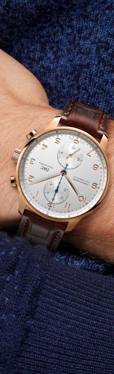 The IWC IW371611 with gold case and brown leather strap