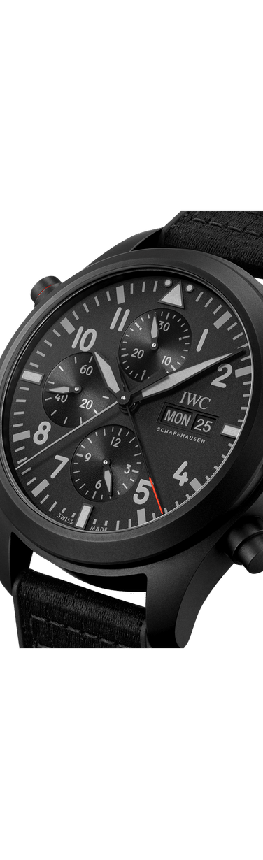 Close up image of IWC Pilot’s Watch Double Chronograph TOP GUN Ceratanium® with black dial, Ceratanium® case and black rubber strap with textile inlay.