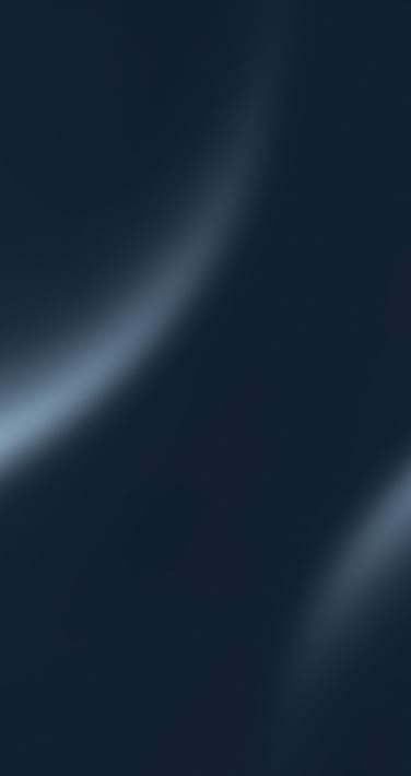 View of Earth from space showing the curvature of the planet with a glowing blue atmospheric horizon against a dark sky