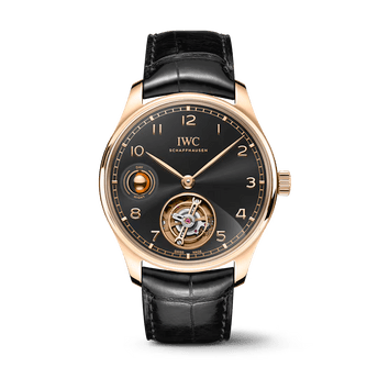 Front shot of IWC Portugieser Hand-Wound Tourbillon Day & Night with black dial, 18 ct Armor Gold® Case and black alligator leather strap by Santoni