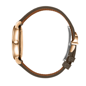 Side shot image of IWC Portofino Automatic Day & Night with gold case and brown leather strap.