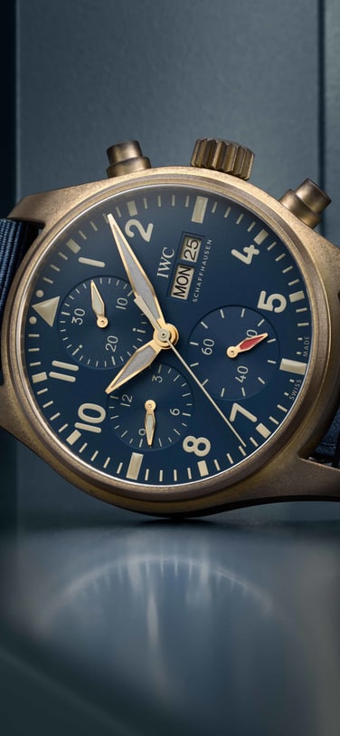 Bronze watch with a blue dial and blue strap
