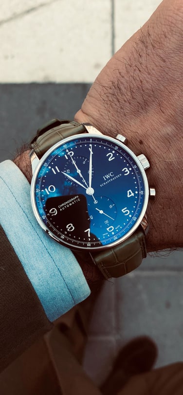 Andreas Weinas wearing Portugieser Chronograph (IW371491) with blue dial and black strap