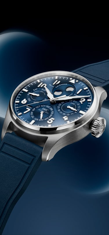 Big Pilot's Watch Perpetual Calendar ProSet Le Petit Prince (ref. IW329601) highlighting the moon phase complication against a soft blue atmospheric background