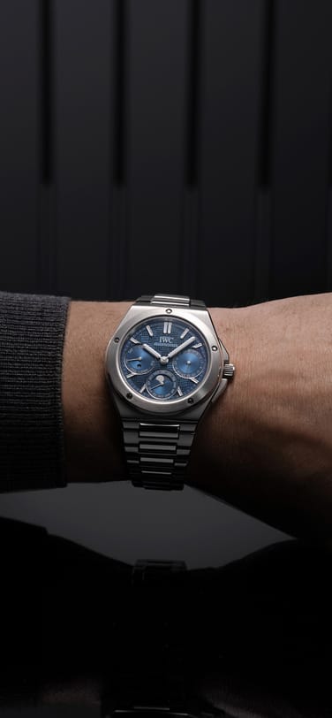 image of Ingenieur Perpetual Calendar watch with blue dial and stainless steel bracelet on a man's wrist