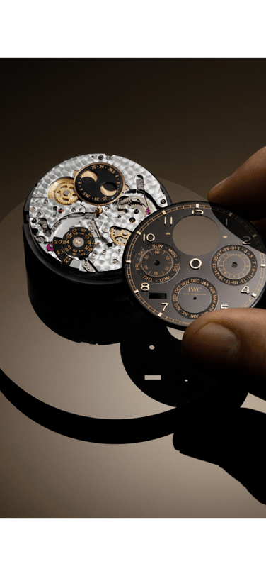 The Portugieser Perpetual Calendar 44 IW503701 receiving its Obsidian black dial with gold appliques
