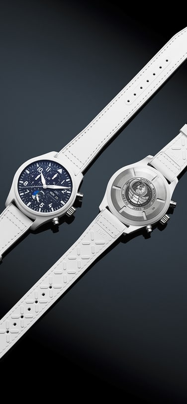 2 IWC Polaris watches laying on dark surface