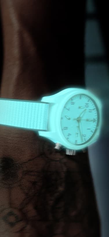 Ceralume Concept Watch on a wrist glowing in blue and green