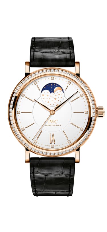 IWC Portofino watch with white dial and black leather strap.