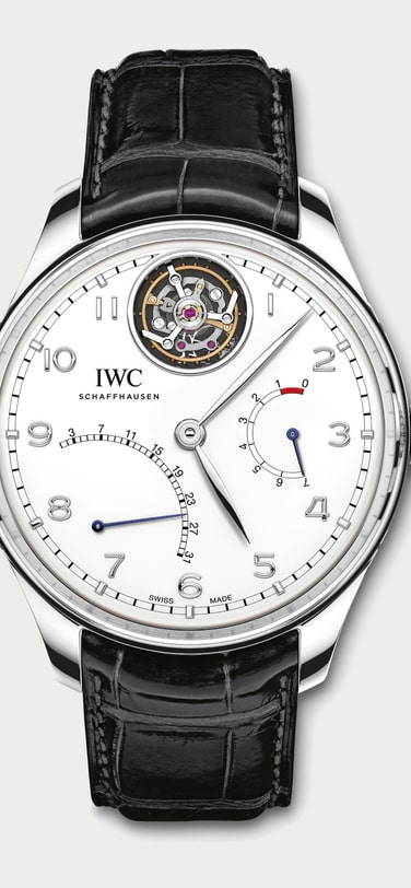 The IW504601 Portugieser Tourbillon Mystère Rétrograde with white dial, steel case, and black strap