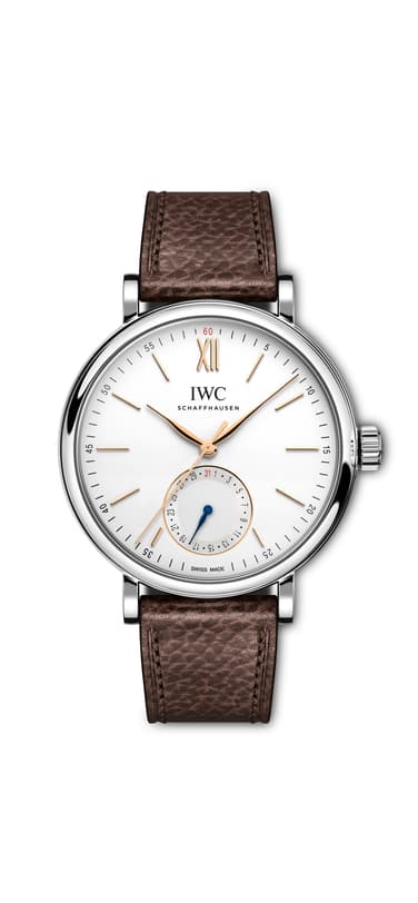 IWC Portofino Automatic Pointer Date IW359201 with white dial, silver case and brown calfskin strap placed on white surface in white background.
