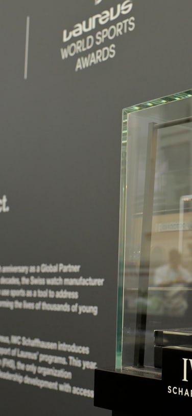 IWC CEO Chris Grainger-Herr next to one of the Academy members.