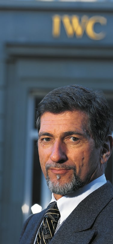 Portrait of Günter Blümlein, a key figure in the revival of IWC Schaffhausen and a prominent leader in the luxury watch industry.
