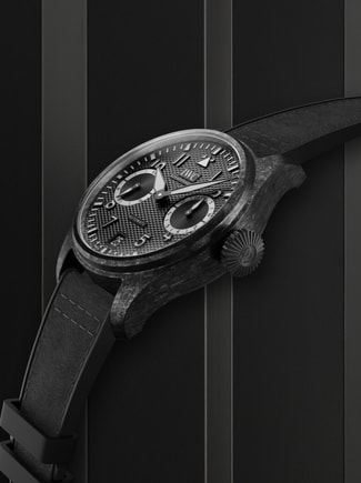 Black CMC watch on black background