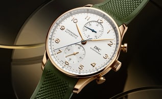 The IWC IW371611 with gold case and green rubber strap