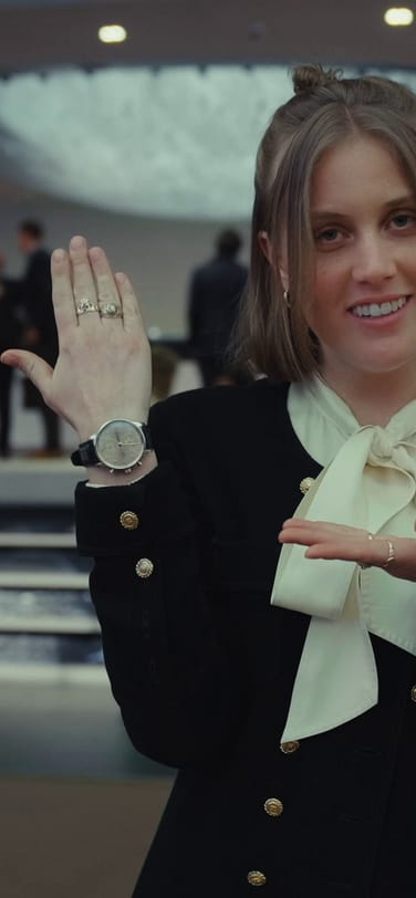 Brynn Wallner at the IWC Booth at Watches and Wonders Geneva 2024 wearing an IWC Portugieser