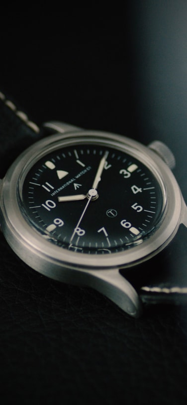 Vintage IWC Pilot´s Watch with black dial, stainless steel case and brown leather strap