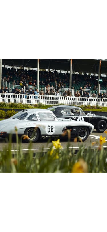 The Mercedes-Benz 300 SL “Gullwing” in silver with the number 68 racing at the Goodwood Members Meeting 2019.