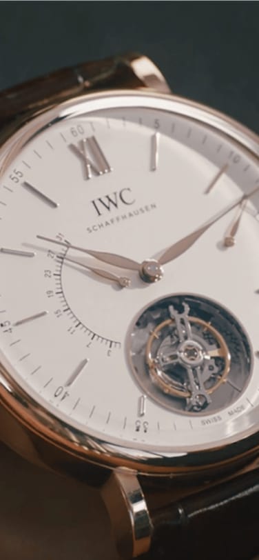 Close up of the Portofino Hand-Wound Tourbillon Retrograde being wound