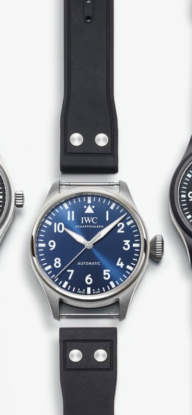 A selection of IWC watches from the front with yellow and dark rubber straps.