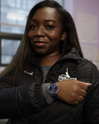 IWC CEO Chris Grainger-Herr with kids at a Laureus Academy event