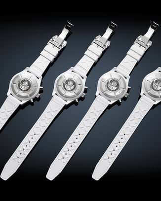 Each titanium case back bears an engraving with the name of one of the four crew members