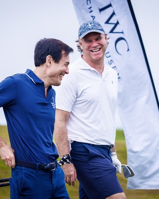 IWC CEO Chris Grainger-Herr with kids at a Laureus Academy event