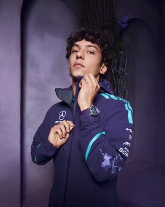 Kimi Antonelli head shot wearing Petronas jacket and Pilot's Watch Chronograph 41 Mercedes-AMG Petronas Formula One™ Team watch.