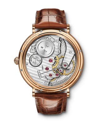 IWC IW544803 Portofino Hand-Wound Vintage Collection backshot with gold case and brown leather strap