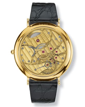 IWC IW525103 Portofino Handwound Moonphase backshot of gold watch mechanism and black leather strap